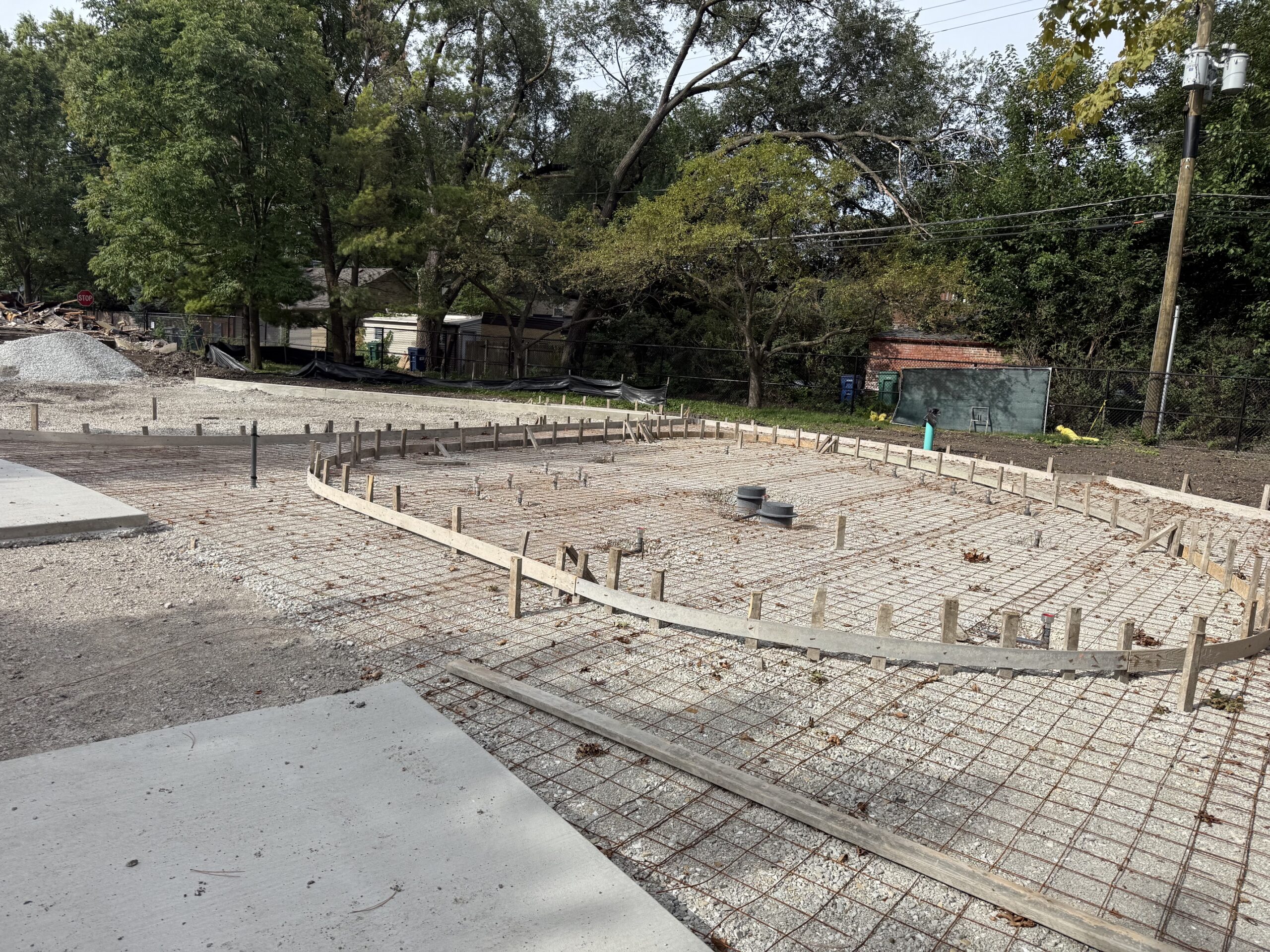 large gravel area covered with rebar