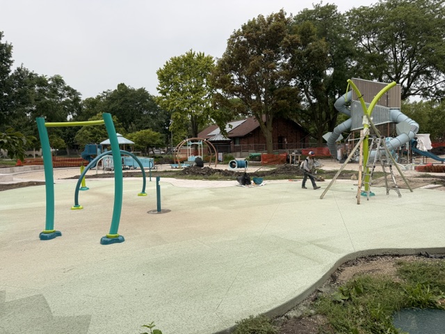 green and blue splash pad amenities