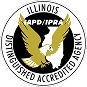 Seal of the Illinois Law Enforcement Training and Standards Board, featuring an eagle, the state outline, and text 'Distinguished Accredited Agency'.