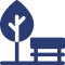 Stylized icon of a tree and a park bench, representing outdoor space or recreation.