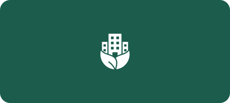 White icon of buildings emerging from stylized green leaves, symbolizing sustainable facilities.