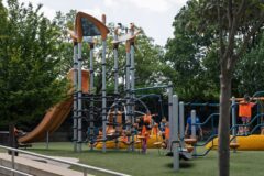 kids playing on yellow playground